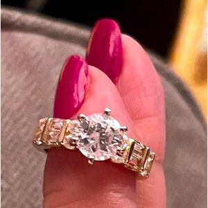 14k gold 2 carats round Diamonique stone.